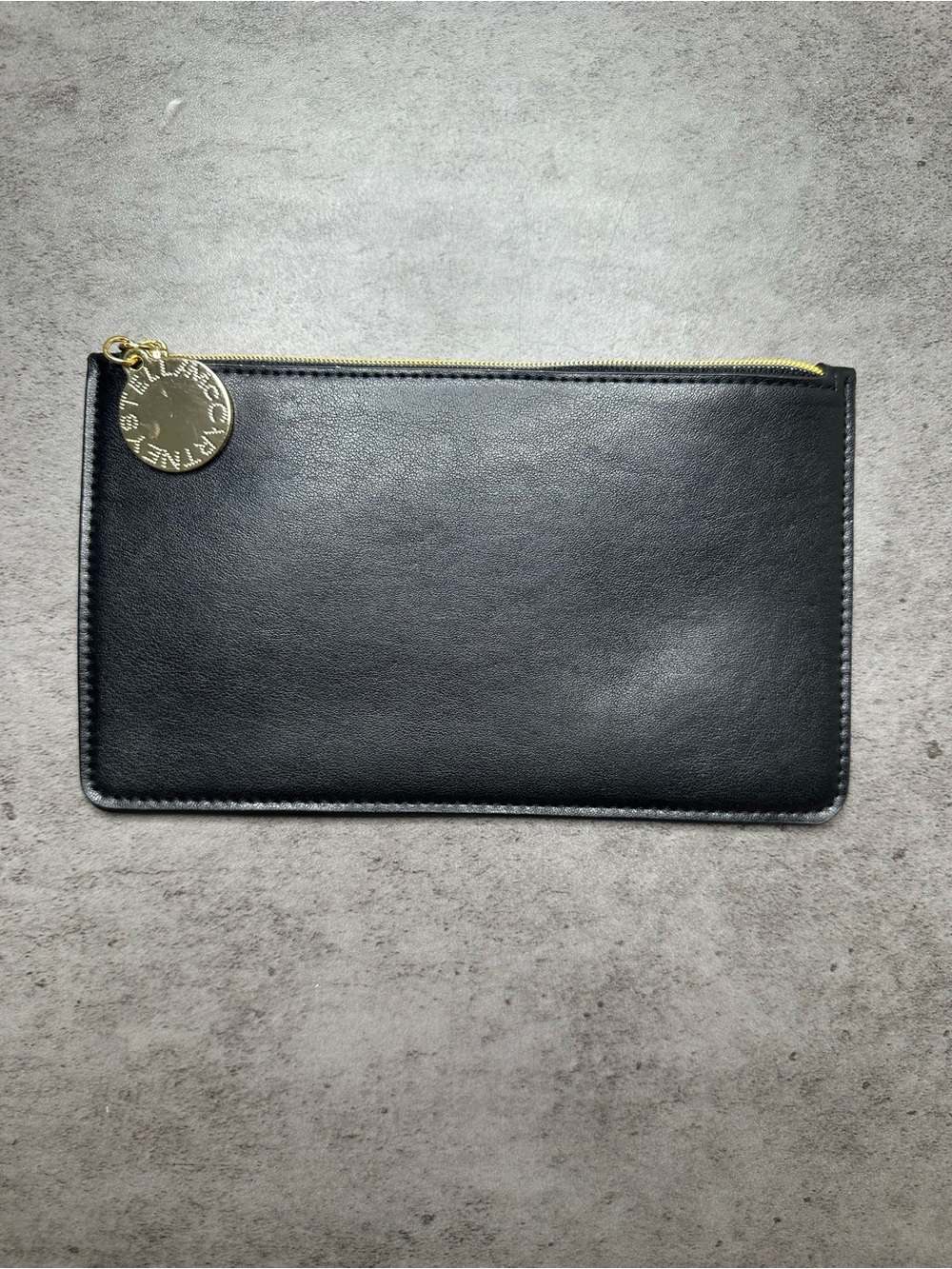 Stella McCartney Black Zip Pouch with Gold Medallion Charm